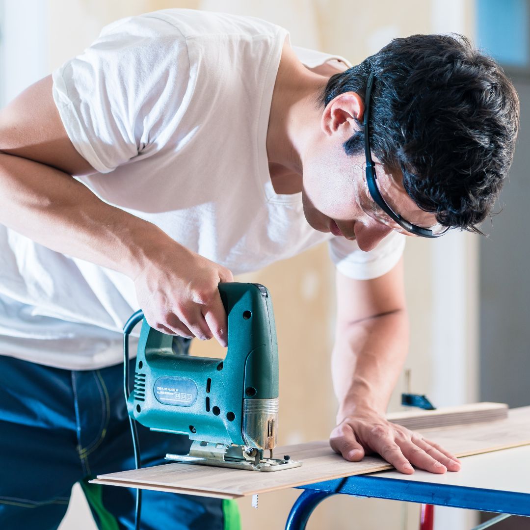 man using power tool